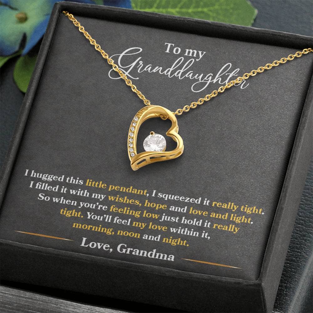 Alt text: "Personalized Granddaughter Necklace - Forever Love Token, a gold heart pendant with a large diamond, elegantly packaged in a box."