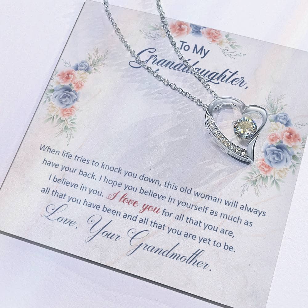 Alt text: "Close-up of heart-shaped pendant on Personalized Granddaughter Necklace of Love"