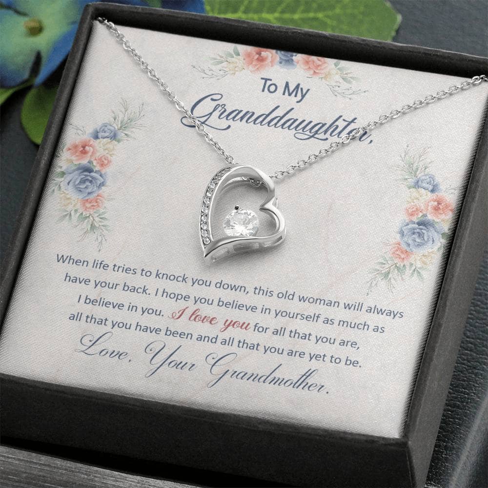 A necklace in a box, featuring a heart-shaped pendant symbolizing the bond between grandparents and granddaughters. Crafted with premium materials and adjustable chains for comfort. Comes in a luxury box with LED lighting. Perfect for everyday wear or special occasions.