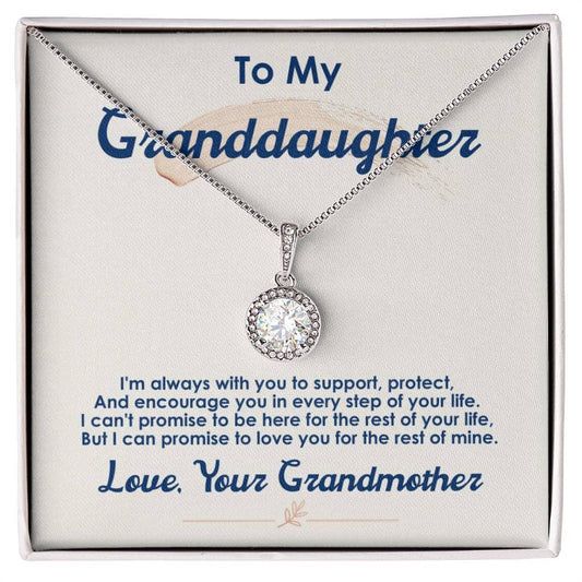 A close-up of a Personalized Granddaughter Necklace with Cubic Zirconia pendant in a box.