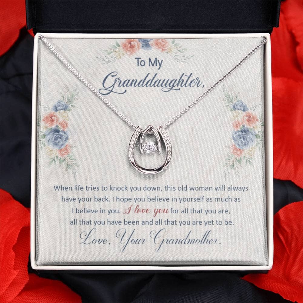 A close-up of a Personalized Granddaughter Necklace with a heart pendant, featuring a premium cushion-cut cubic zirconia.