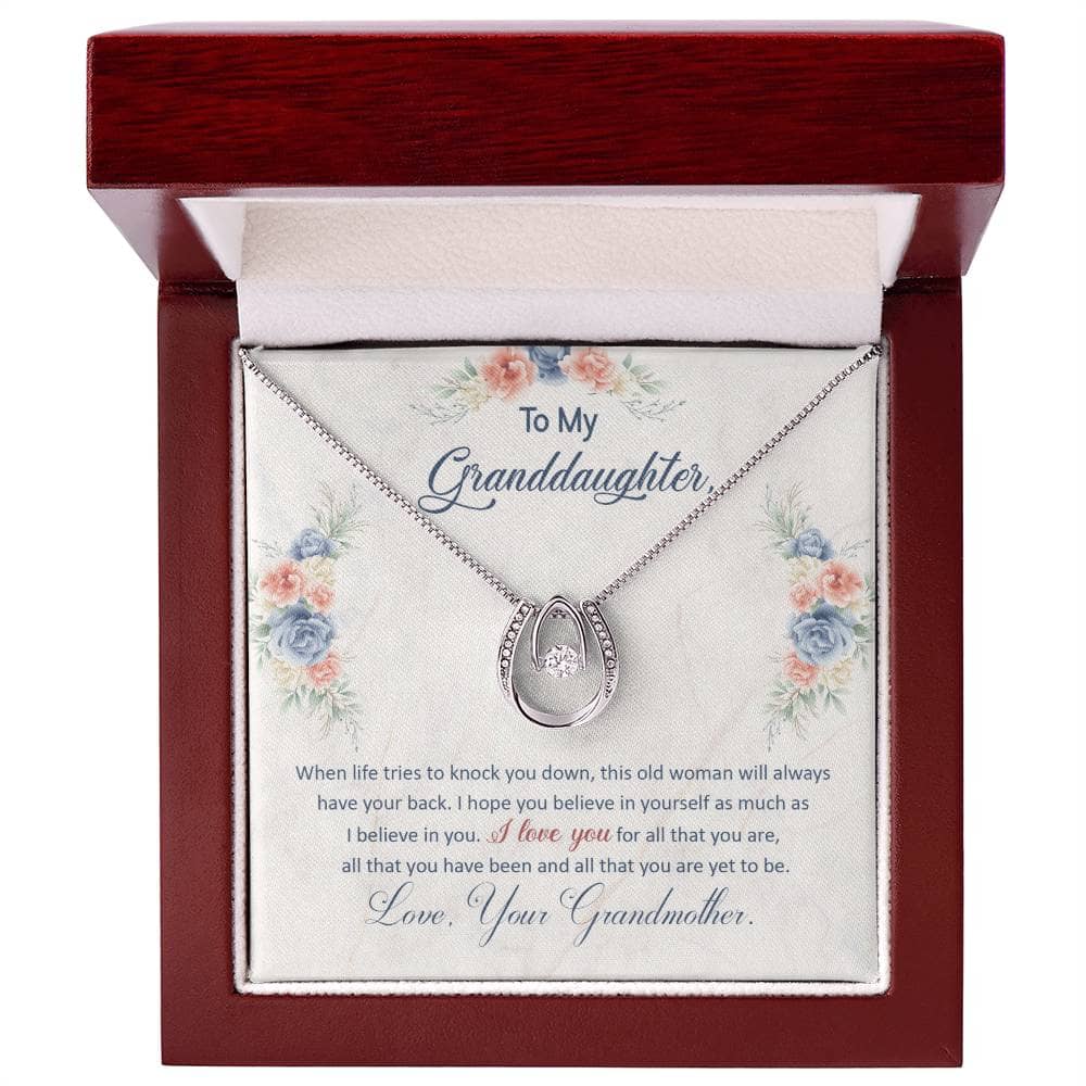 A close-up of a Personalized Granddaughter Necklace with a heart pendant, featuring a premium cushion-cut cubic zirconia.