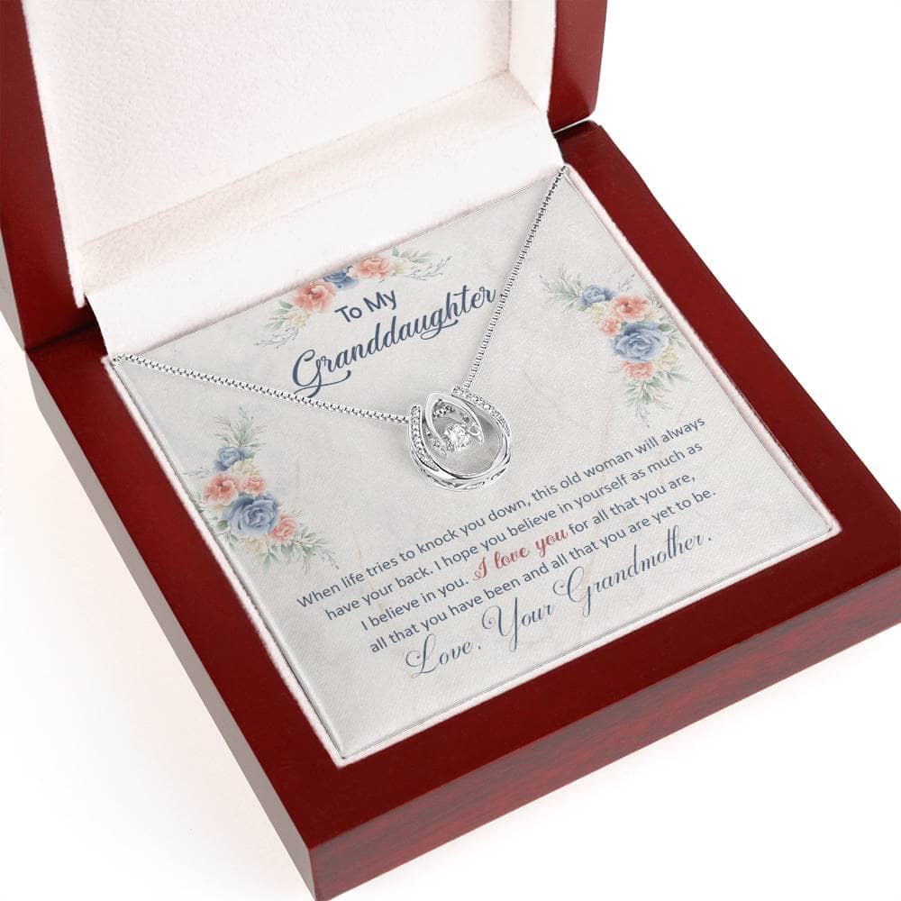 A close-up of a Personalized Granddaughter Necklace with Heart Pendant in a box.