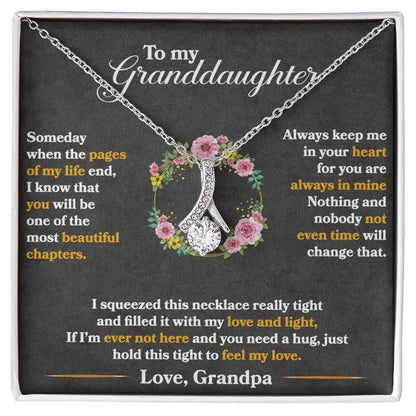 Alt text: "Personalized Granddaughter's Embrace Necklace in mahogany-style box with LED lighting"