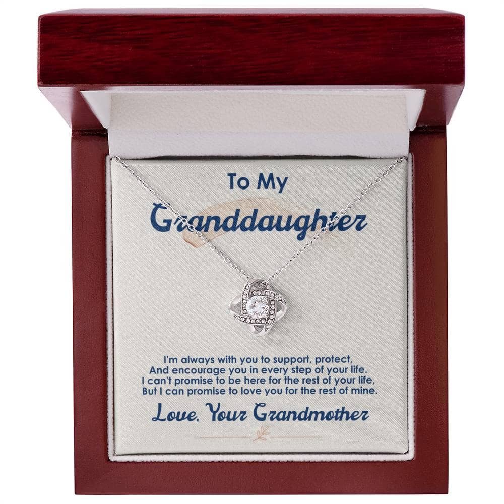 Alt text: "Personalized Love Knot Necklace for Granddaughter in a sophisticated mahogany-style box with LED lighting"