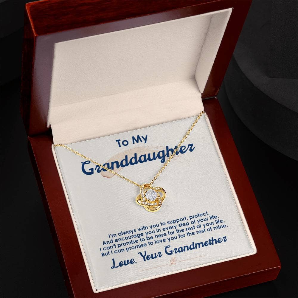 Alt text: "Personalized Love Knot Necklace for Granddaughter in a luxurious mahogany-style box with LED lighting"