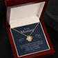 A gold necklace with a diamond pendant in a box, part of the Personalized Mother Necklace Collection - A Gift Of Love From Child.