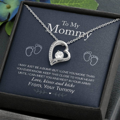 Alt text: "Personalized Mother Necklace in a box - A symbol of love and appreciation from children. Shimmering cubic zirconia pendant on an adjustable chain. Elegantly packaged for a memorable gift."
