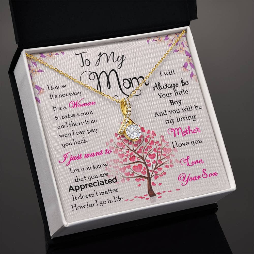 Alt text: "Personalized Mother Necklace - A heart-shaped pendant in a box, symbolizing the eternal bond between a mother and her children."