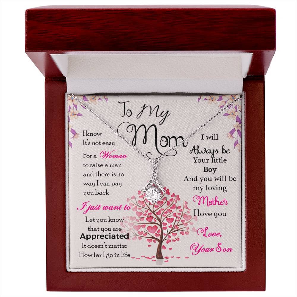 Alt text: "Personalized Mother Necklace - A heart-shaped pendant in a box, symbolizing the eternal bond between a mother and her children."