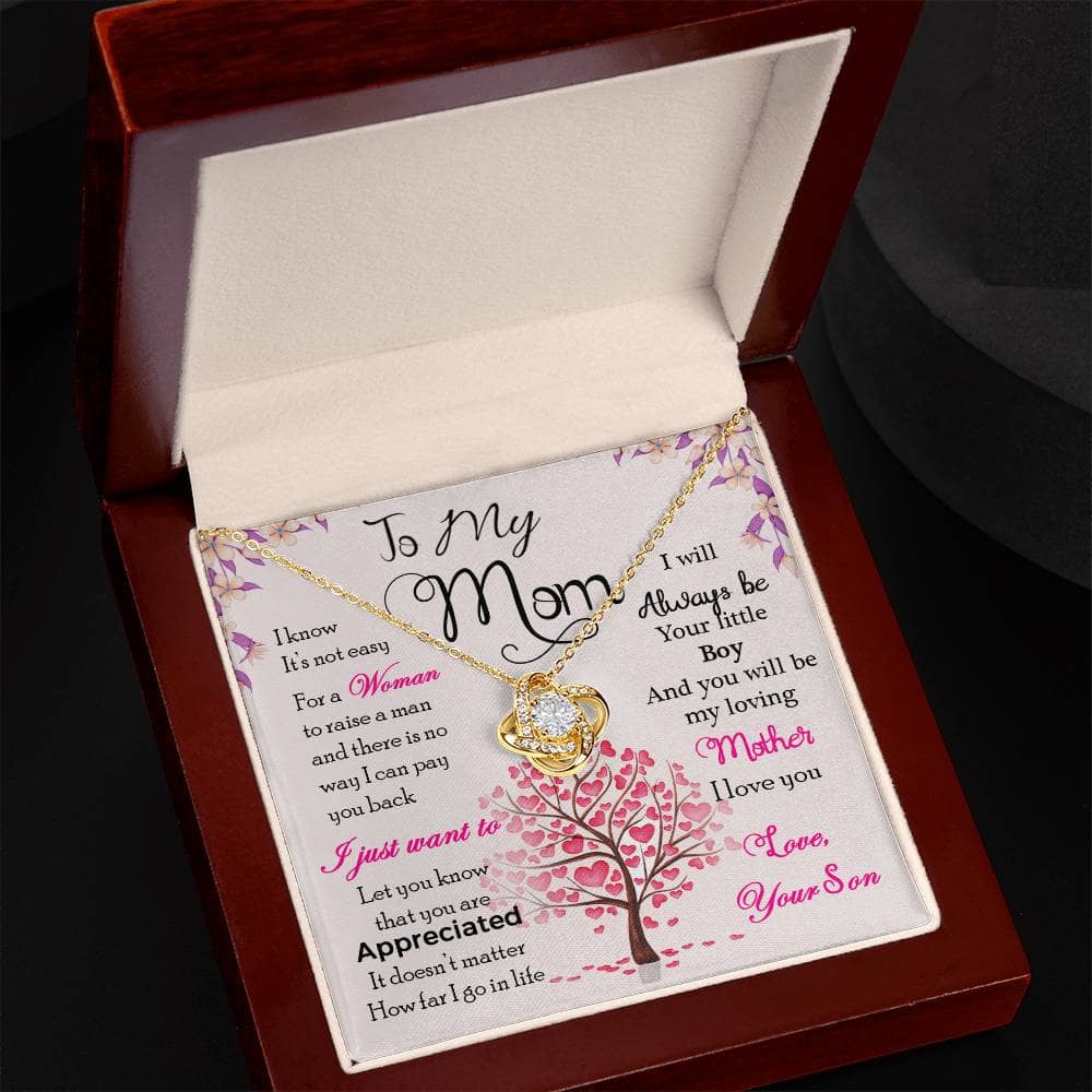 Alt text: "Personalized Mother Necklace in a box - A stunning tribute to the bond between mothers and children, adorned with cubic zirconia stones for an elegant finish."