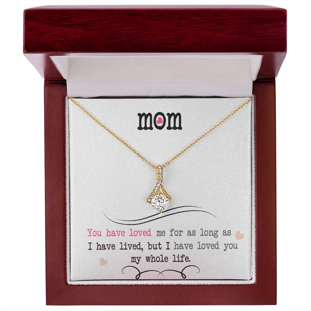 A necklace in a box, featuring an elegant heart pendant. Personalized Mother Necklace - Elegant Heart Pendant Gift From Child.