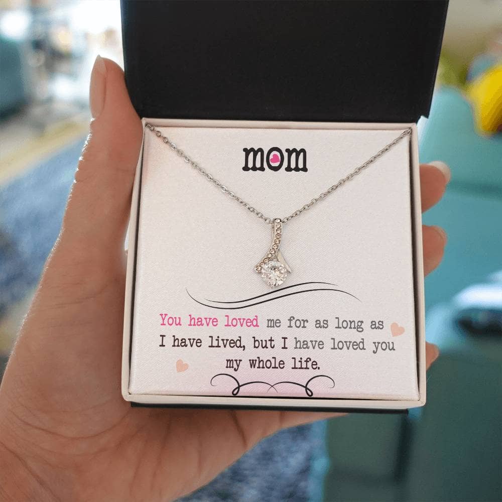 A hand holding a necklace in a box - Personalized Mother Necklace - Elegant Heart Pendant Gift From Child