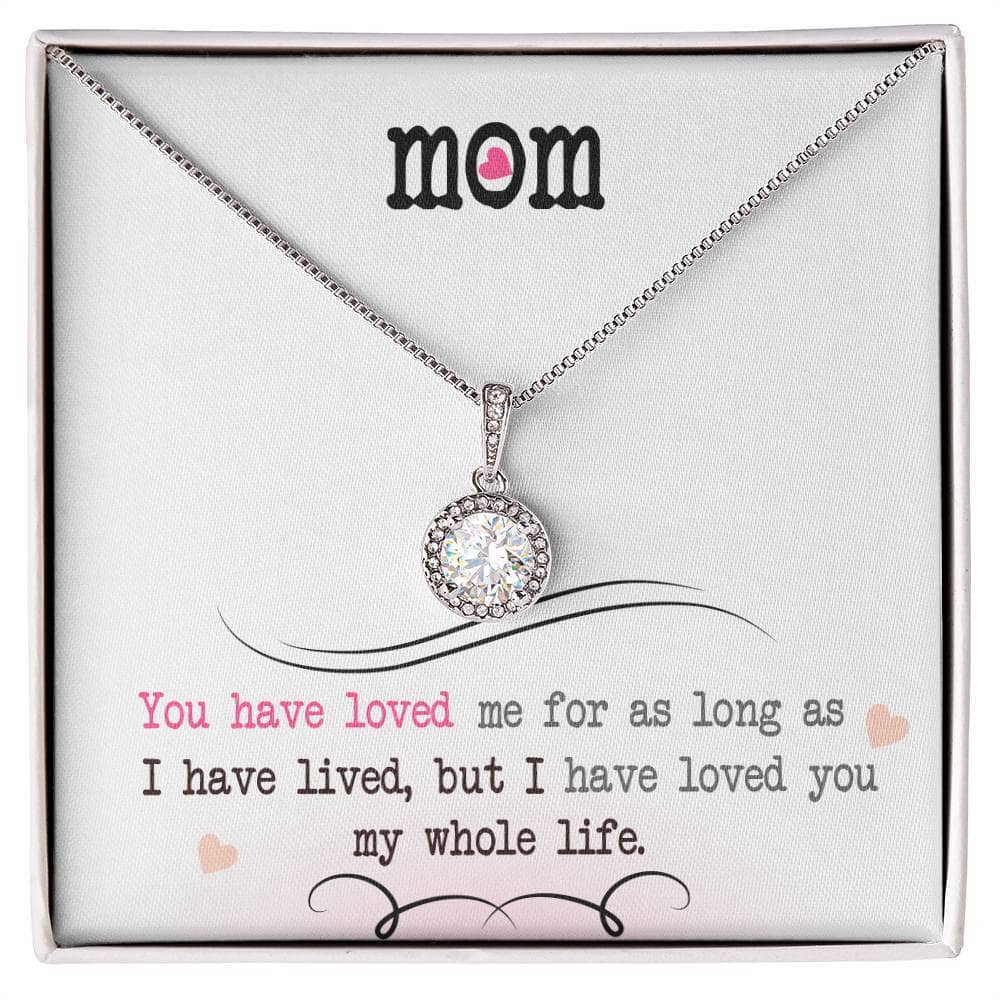 Alt text: "Personalized Mother Necklace - a necklace in a box, featuring a diamond pendant symbolizing love and care. Ideal for sons and daughters to show love to their mothers. Perfect for birthdays, milestones, and holidays. Celebrate the unbreakable mother-child bond with elegance and longevity."