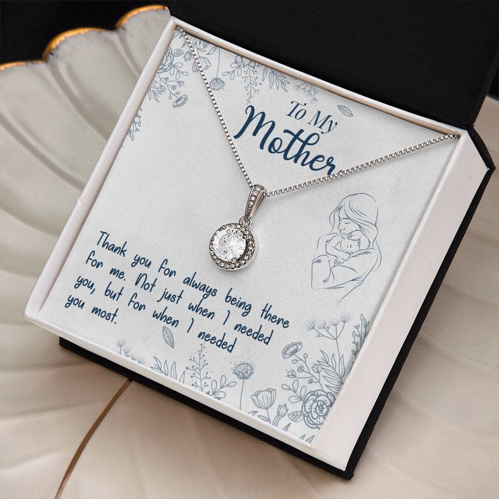 Alt text: "Personalized Mother Necklace - Necklace in a box with a heart-shaped pendant and cushion-cut cubic zirconia stone, symbolizing maternal love and strength. Delicate dimensions, adjustable chain, and lavish mahogany-style box with LED lighting. Ideal for milestones, birthdays, or holidays. Ethically sourced and crafted with love."