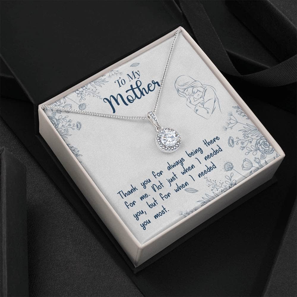 Image: A necklace in a box.

Alt text: Personalized Mother Necklace - Eternal Hope Love Token From Child, a necklace in a mahogany-style box with LED lighting.