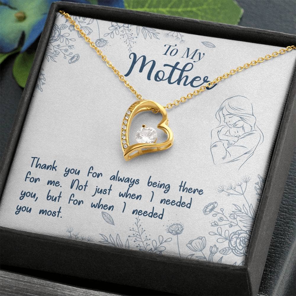 A necklace in a box from the Personalized Mother Necklace Collection - From Child's Heart To Mom's. Symbolize the unbreakable bond between a mother and child with this elegant accessory. Perfect for daily wear or special occasions. Packed inside a luxurious LED lit mahogany-style box for a magical gifting experience.