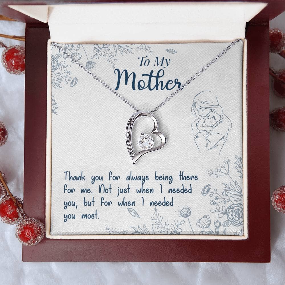 Alt text: "Personalized Mother Necklace in a box - a sparkling pendant symbolizing the unbreakable bond between a mother and child."