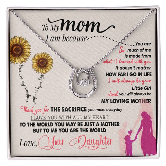 A necklace in a box, symbolizing the cherished bond between a mother and child. Crafted with elegance and premium quality, adorned with a cushion-cut cubic zirconia. Adjustable chain for a perfect fit. Packaged in a luxurious box with LED lighting. Perfect for milestone moments and expressing love.