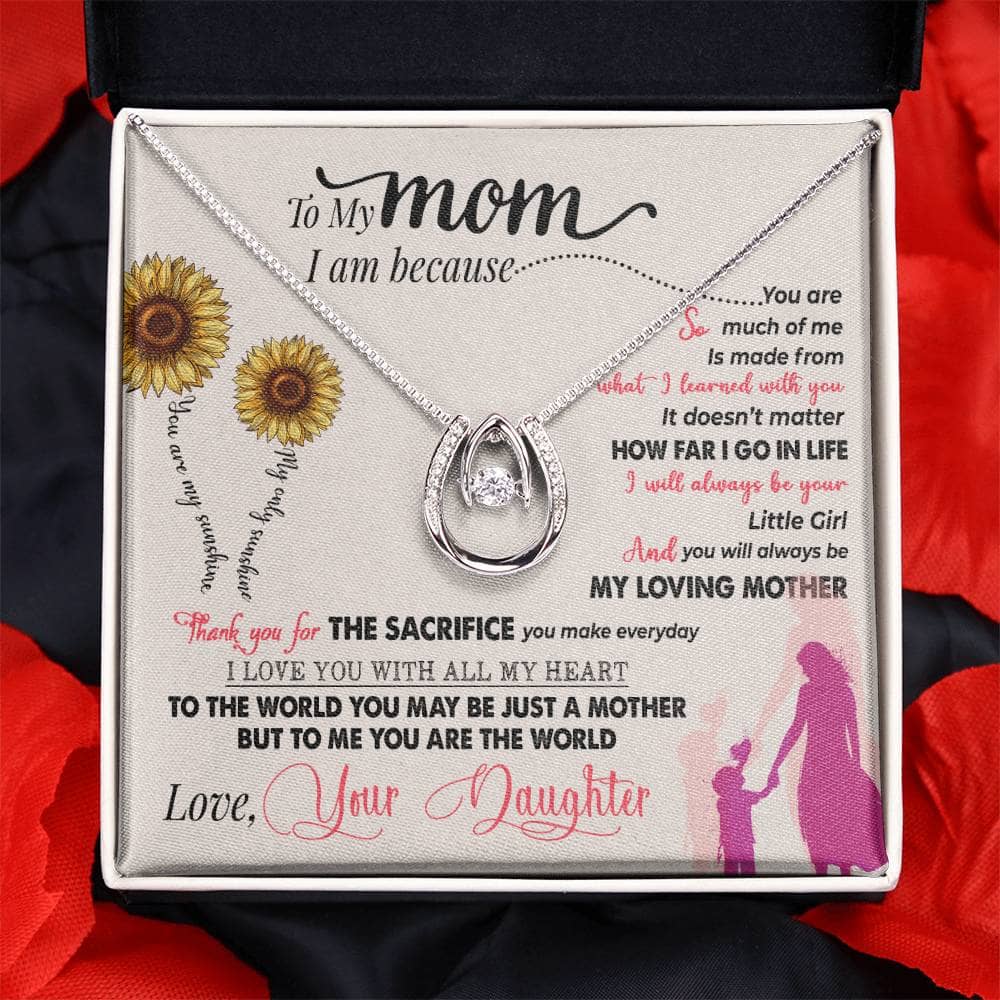 A personalized mother necklace in a box, symbolizing the enduring bond between mothers and their babies.