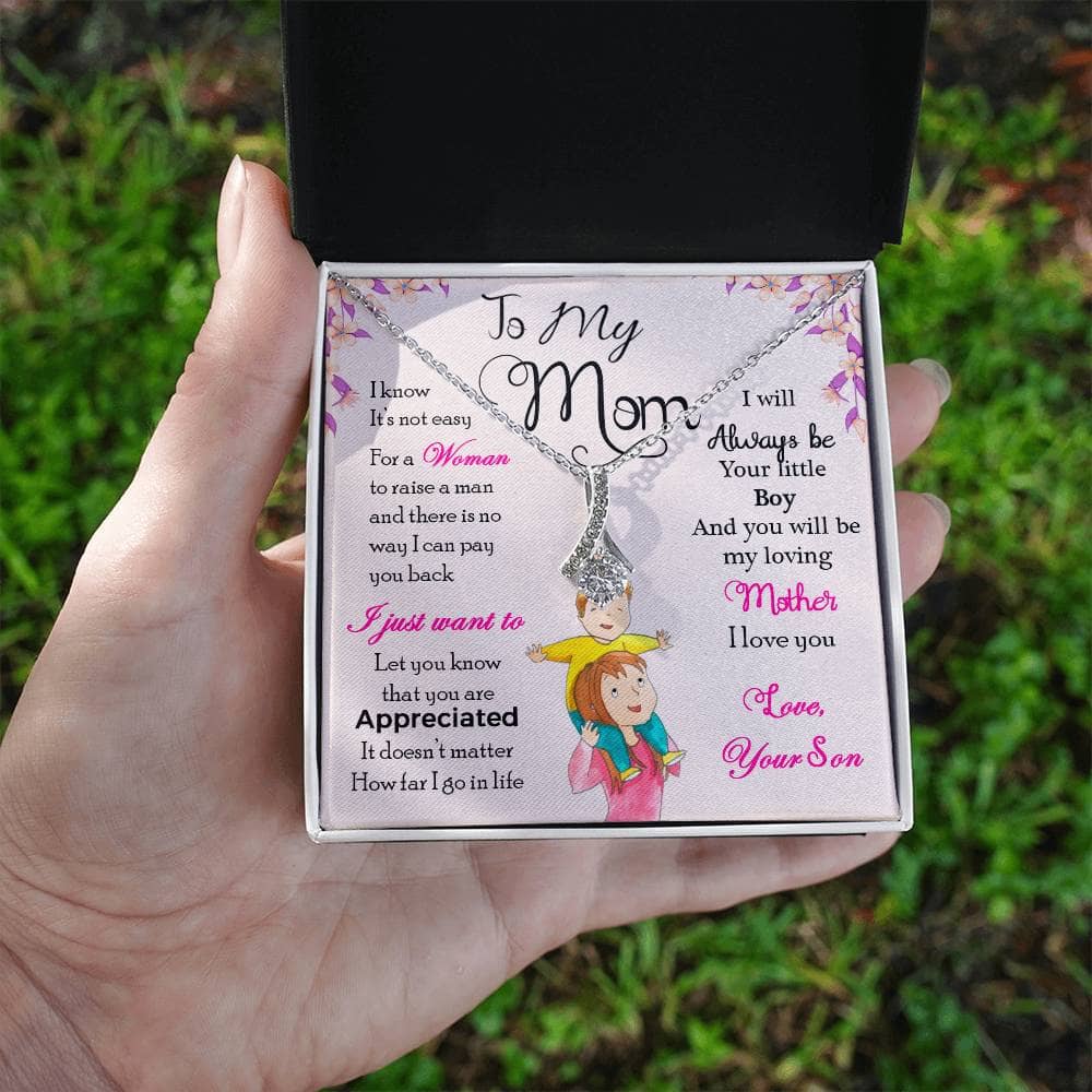 A hand holding a box with a necklace from the Personalized Mother Necklace collection - Gift From Son Or Daughter.