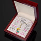 Alt text: "Customized Mother Necklace in a box - a symbol of love and connection, featuring a heart-shaped pendant and adjustable chain. Crafted with cushion-cut cubic zirconia in 14k white gold or 18k yellow gold finish. Packaged luxuriously in a mahogany-style box with LED lighting."