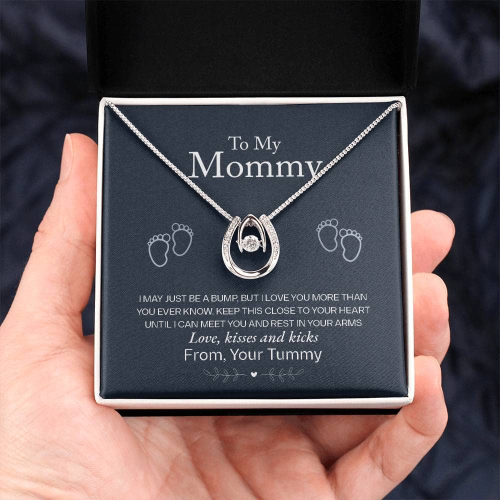 Alt text: A hand holding a Personalized Mother Necklace in a luxury box