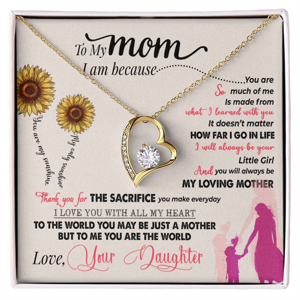 Alt text: "Personalized Mother Necklace in a box - gold heart pendant with diamond, symbolizing the bond between mothers and children."