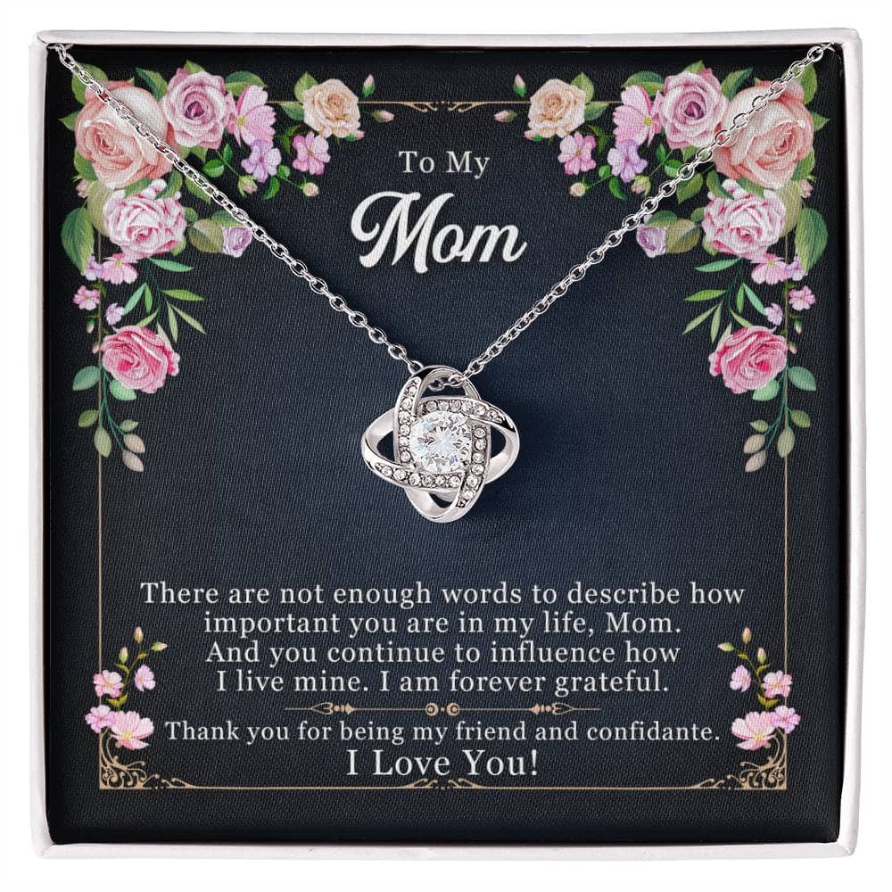 A personalized mother necklace with a heart-shaped pendant adorned with cubic zirconia crystals, symbolizing an unbreakable bond.