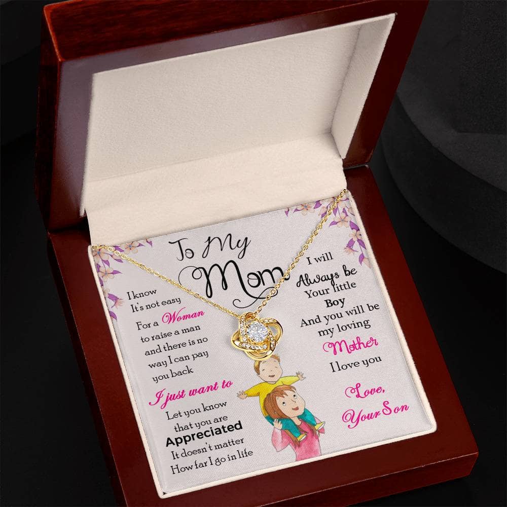 Alt text: "Personalized Mother Necklace - Love Knot Gift From Son/Daughter, a necklace in a box with heart-shaped pendant and adjustable chain, symbolizing the bond between mother and child."