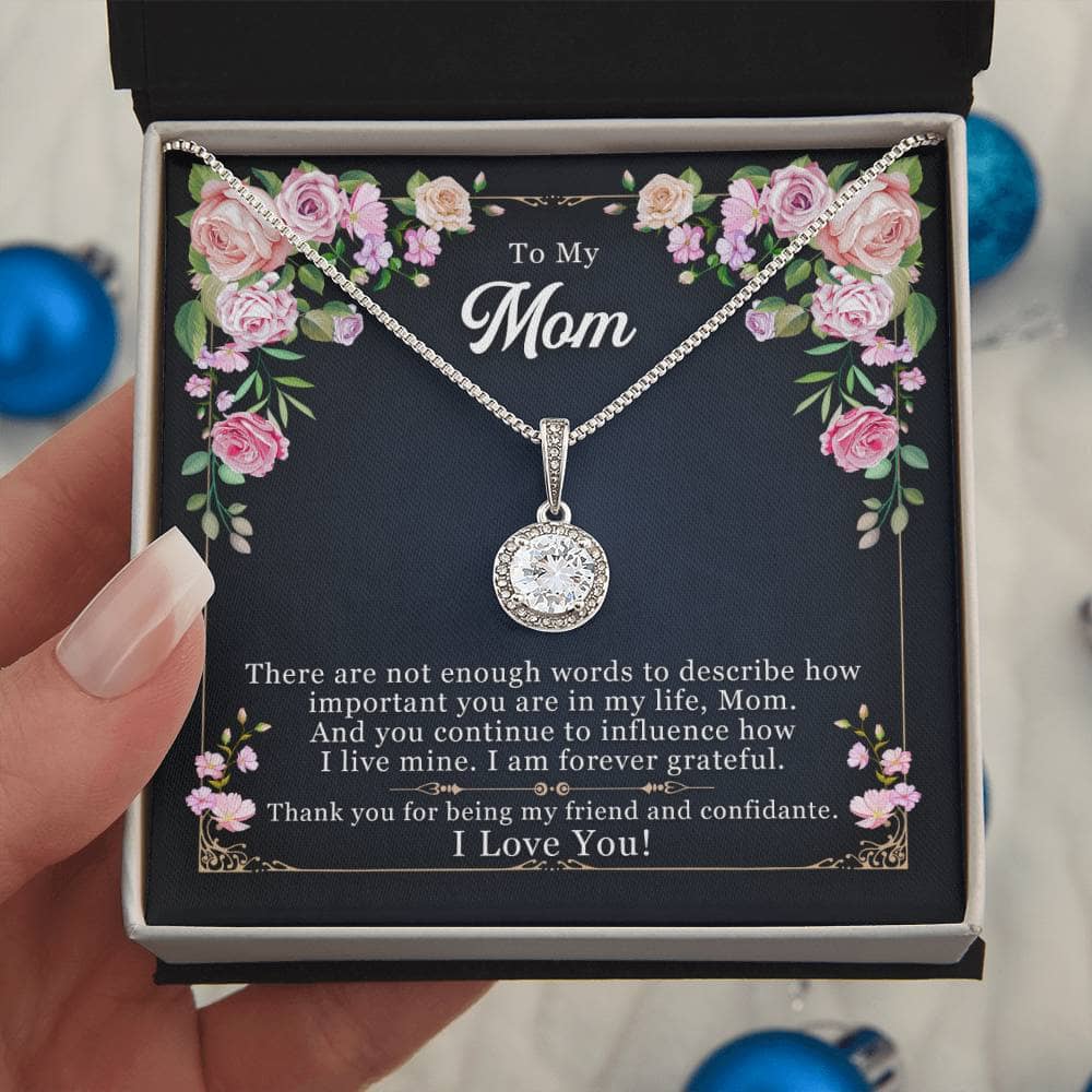 Alt text: "Hand holding Personalized Mother Necklace in box - a symbol of love and elegance"