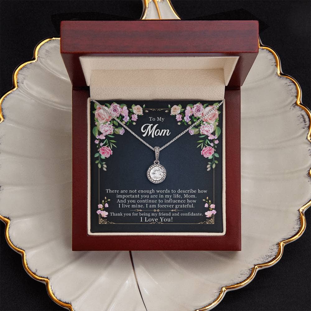 Alt text: "Personalized Mother Necklace - Necklace in box on plate, heart-shaped pendant, adjustable chains, LED-equipped mahogany-style box. Perfect gift for mom."