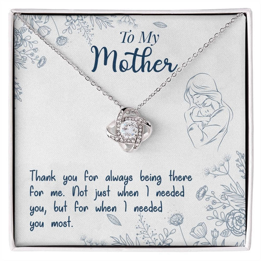 Alt text: "Personalized Mother Necklace - Premium Love Knot Gift: A close-up of a diamond necklace in a box, symbolizing the unbreakable bond between a mother and her children."
