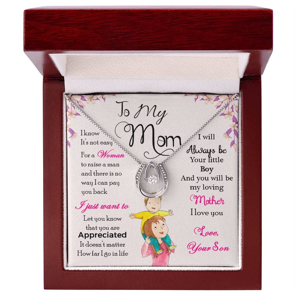 Alt text: "Personalized Mother Necklace in a box, featuring a heart-shaped pendant and glistening cubic zirconia. Adjustable cable and box chains included. Luxurious mahogany-style box with LED lighting. Ideal gift for mother-child relationships."