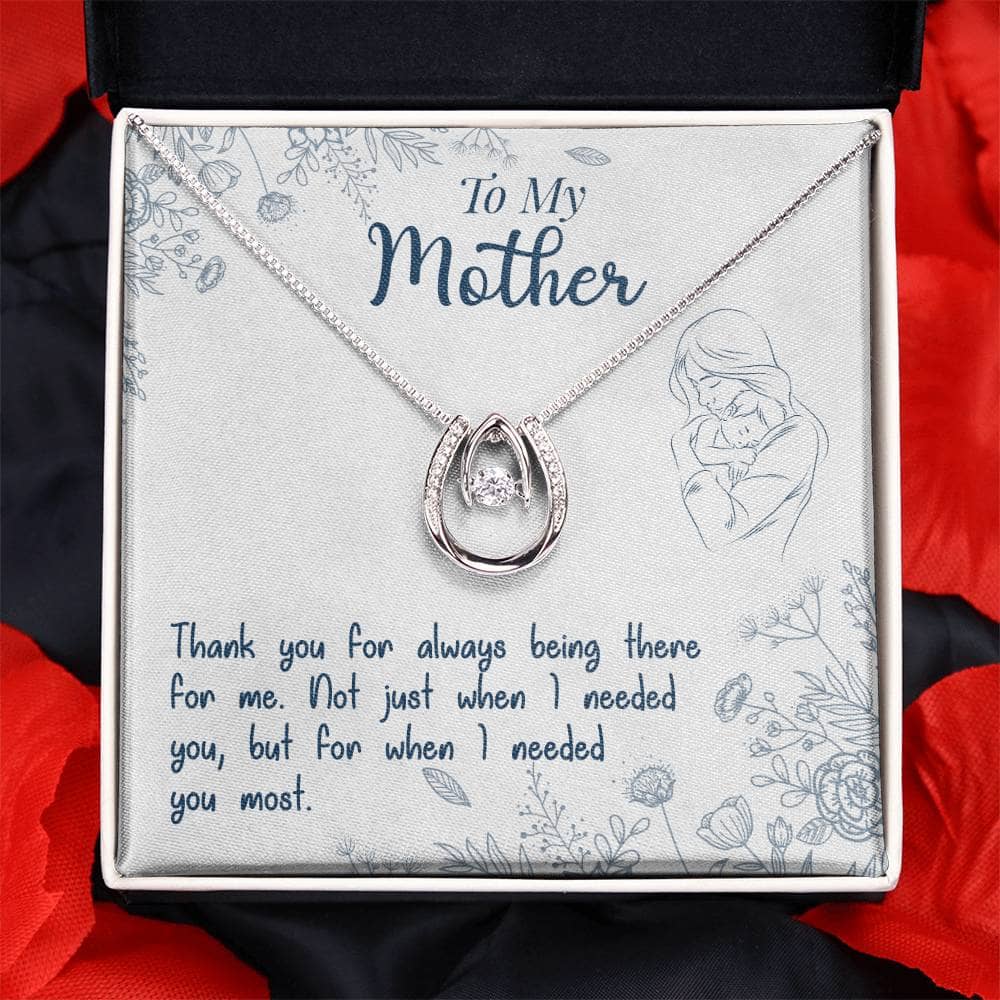 Alt text: "Personalized Mother Necklace with heart-shaped pendant and diamond, elegantly packaged in a mahogany-style box with LED lighting"