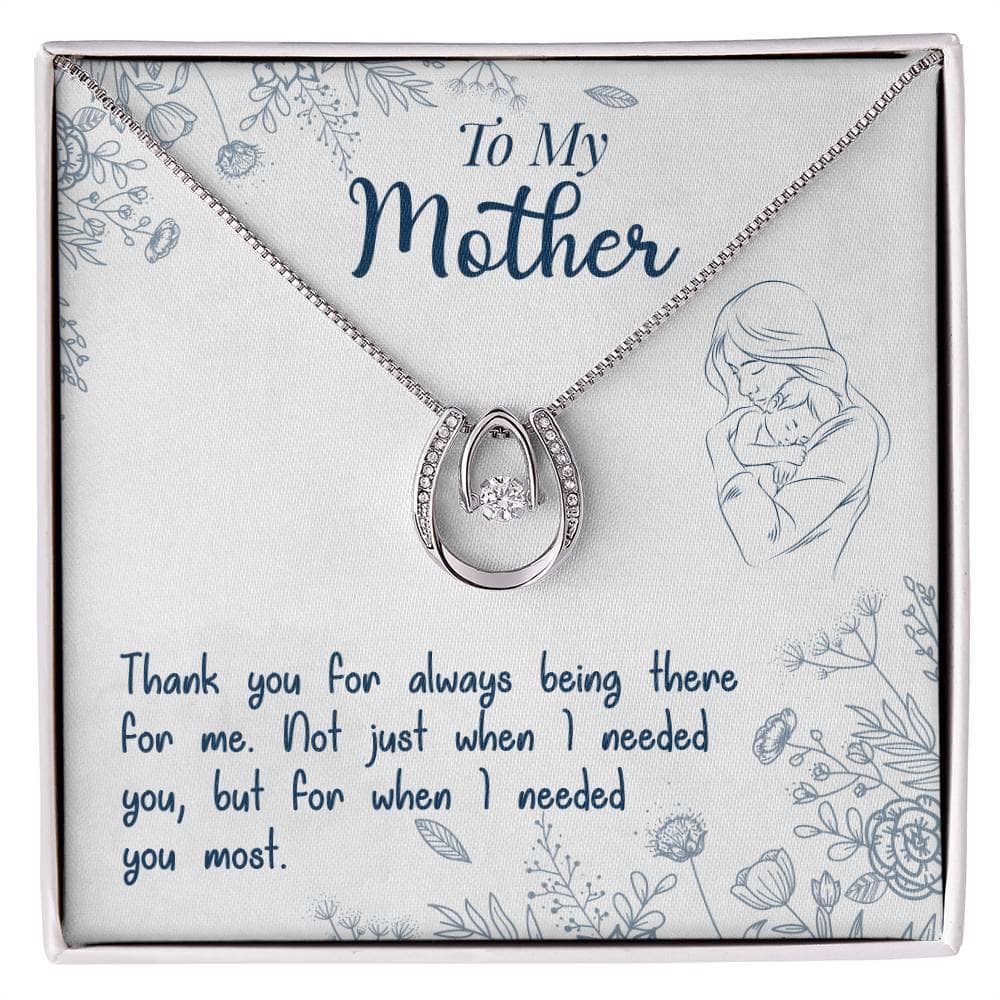 Alt text: "Personalized Mother Necklace with heart-shaped pendant and cushion-cut cubic zirconia, elegantly packaged in mahogany-style box with LED lighting."