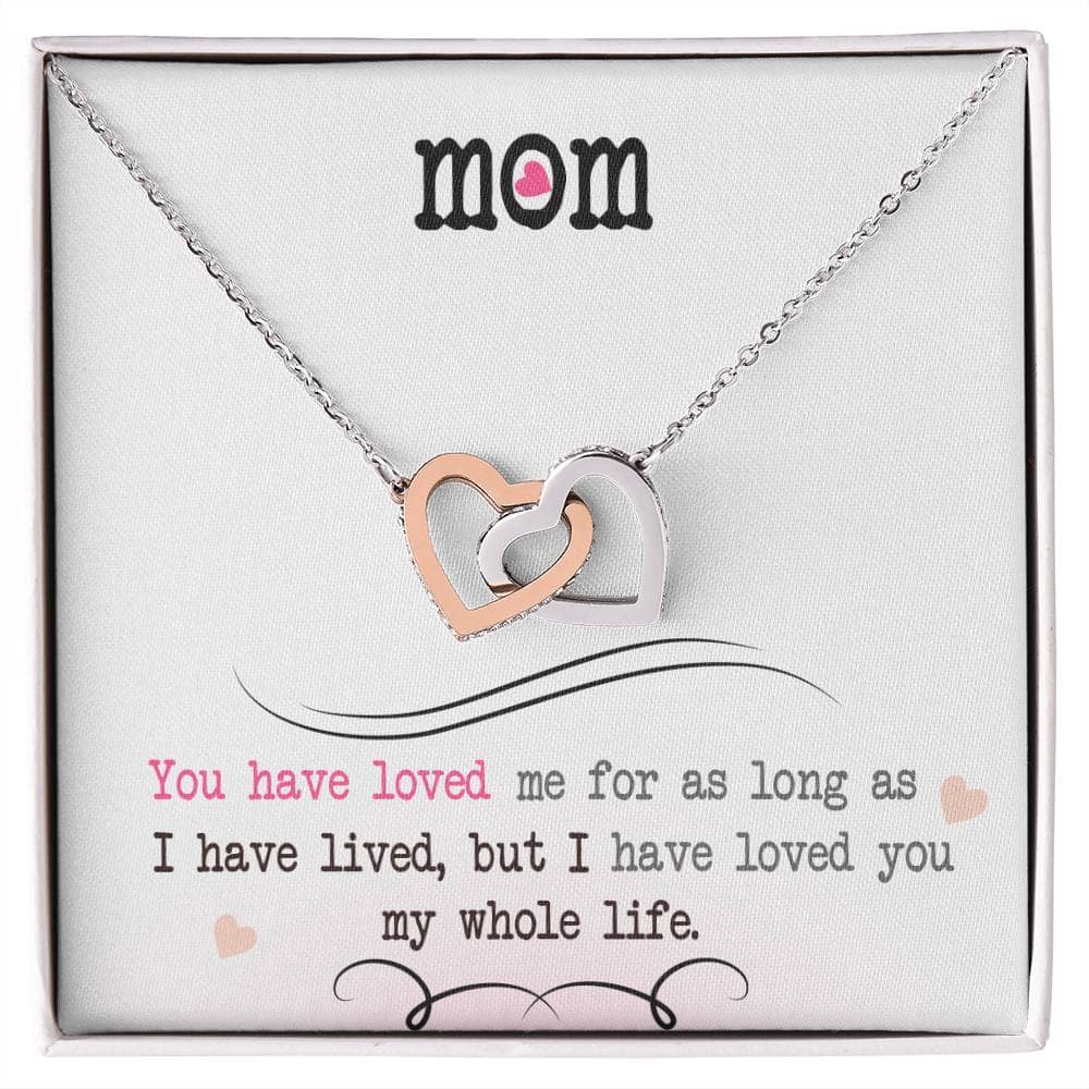 Alt text: "Personalized Mother Necklace with two heart pendants adorned with cubic zirconia crystals, adjustable length, and secure lobster clasp."