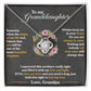 A necklace in a box, featuring a flower design. Personalized Necklace for Cherished Granddaughters.