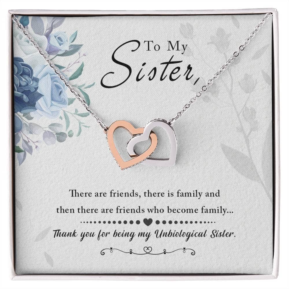 A necklace in a box, featuring a heart-shaped pendant. Personalized Soul Sister Necklace with cushion-cut cubic zirconia. Crafted with top-notch quality materials. Adjustable cable or box chain for comfort and versatility. Packaged in a soft-touch box or upgrade to a luxurious mahogany-style box with LED lighting.