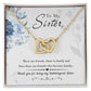 A gold necklace in a box, featuring a heart-shaped pendant. The Personalized Soul Sister Necklace celebrates the enduring bond of sisterhood.