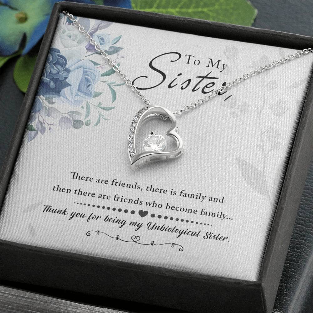 A personalized Soul Sister Necklace with an elegant heart pendant, symbolizing a cherished bond. Choose between a classic cable chain or adjustable box chain. Packaged in a luxurious mahogany-style box with soft LED lighting.