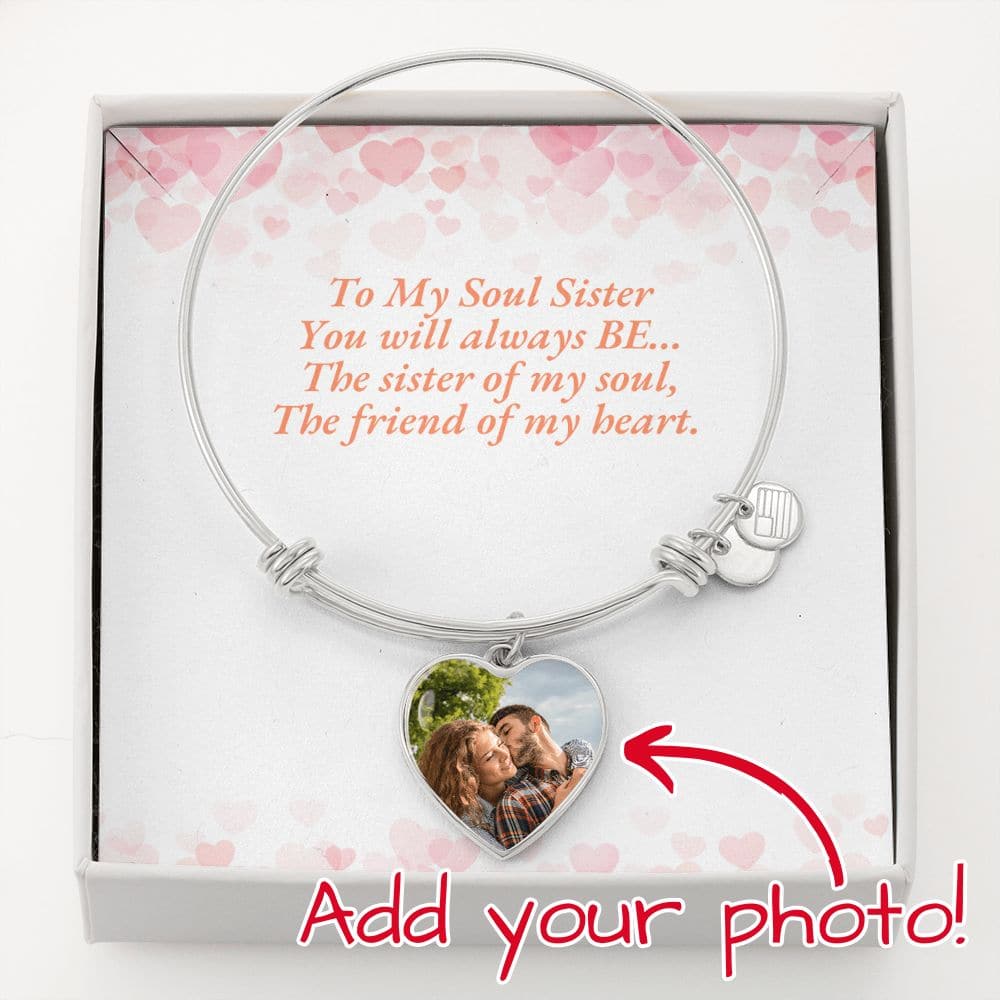 A silver bracelet with a heart charm, a perfect gift to celebrate the bond between soul sisters.