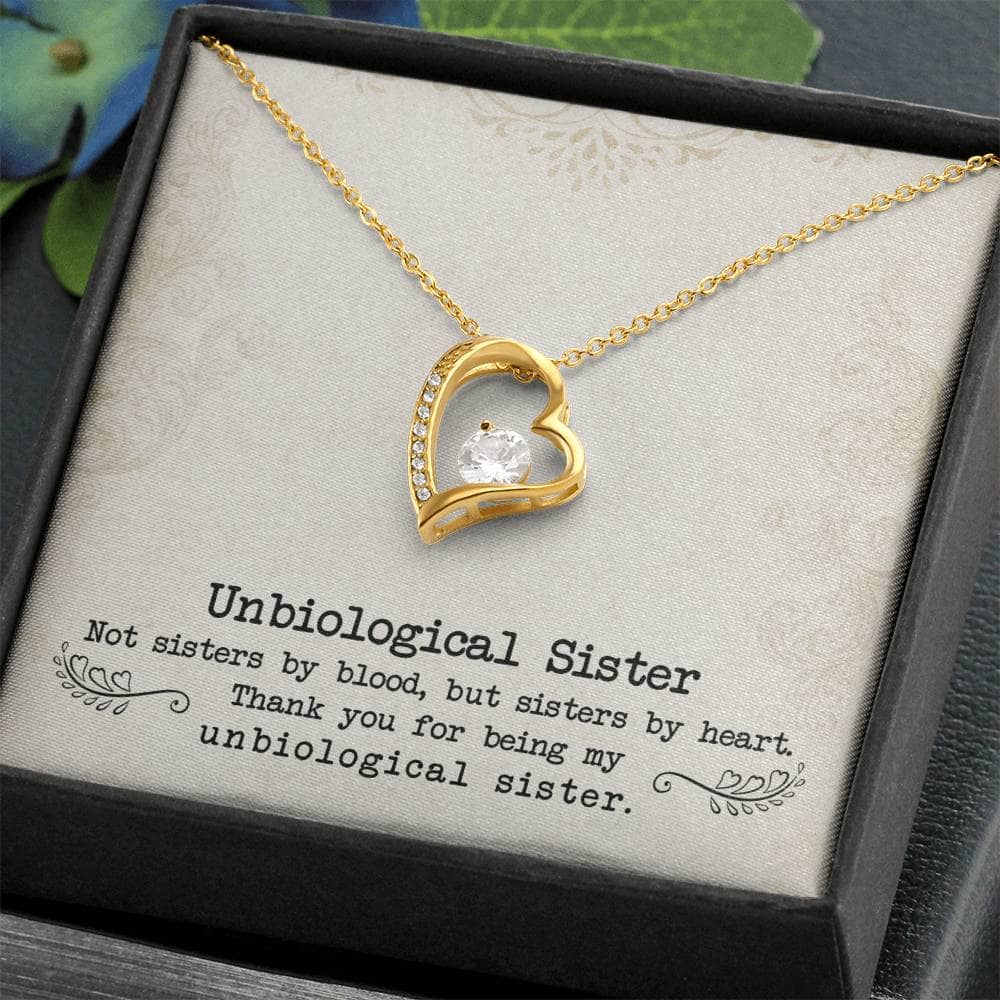 A personalized necklace in a box, symbolizing the unbreakable bond of sisterhood. Made with 14k or 18k gold finish and adorned with cubic zirconia.