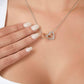 Alt text: "Close-up of a woman wearing a personalized Wife Necklace with a cushion-cut Zirconia heart pendant."