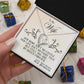 Alt text: A hand holding the Personalized Wife Necklace in an elegant box