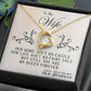Alt text: "Personalized Wife Necklace: Gold heart pendant with cubic zirconia centerpiece in mahogany-style box with LED lighting."