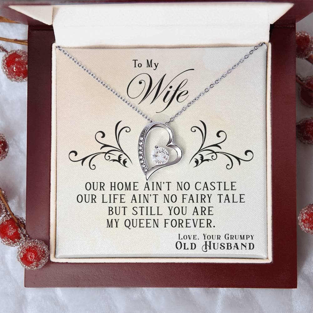 Alt text: "Endless Love Personalised Wife Necklace: Heart-shaped pendant with cushion-cut cubic zirconia centerpiece and dazzling crystals, elegantly presented in a mahogany-style box."