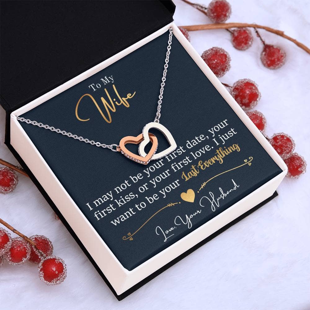 A necklace in a box, featuring a heart-shaped pendant adorned with cubic zirconia gemstones. Made from surgical steel with an 18k gold finish. Adjustable chain length. Comes in a soft touch box or upgrade to a luxury box with LED spotlight.