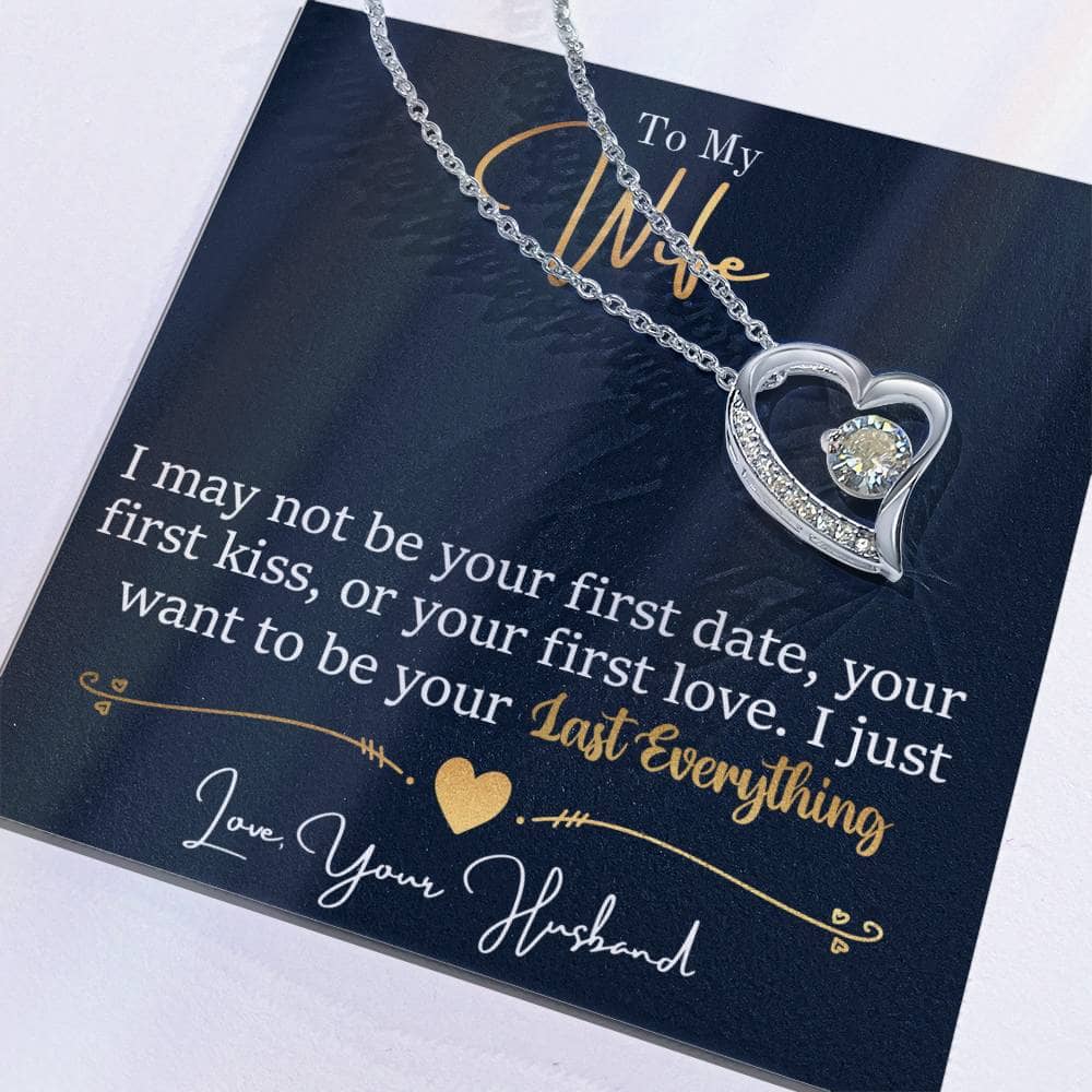 Alt text: "Personalized Wife Necklace: Elegant heart-shaped pendant with cubic zirconia centerpiece on a card"