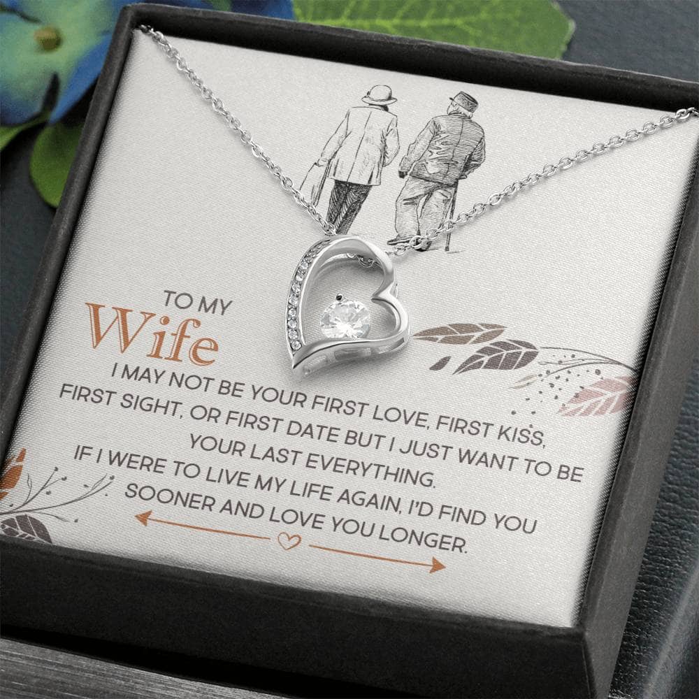 A necklace in a box, personalized for wives, symbolizing enduring love and connection. Crafted with high-grade materials and adorned with a cubic zirconia stone. Pendant dimensions: 0.8" height / 0.7" width. Adjustable chain length: 18" - 22". Secure lobster clasp.